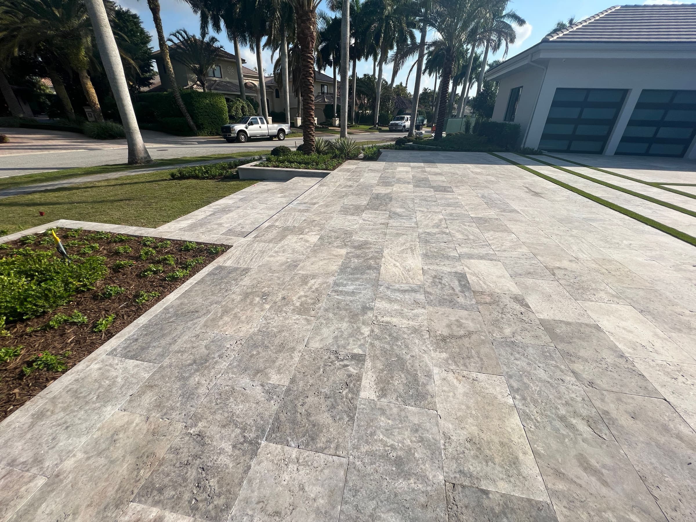Completed site work and paver installation by Masson Construction